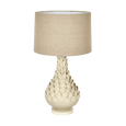 Petal ceramic table lamp with natural linen shade styled on a bedside table in a modern coastal interior