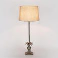 Pineapple table lamp styled on bedside table creating warm ambient lighting