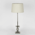 Pineapple table lamp with detailed base and spiked leaves in Hamptons style interior