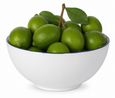 White stoneware bowl with blue-grey rim filled with fresh green limes
