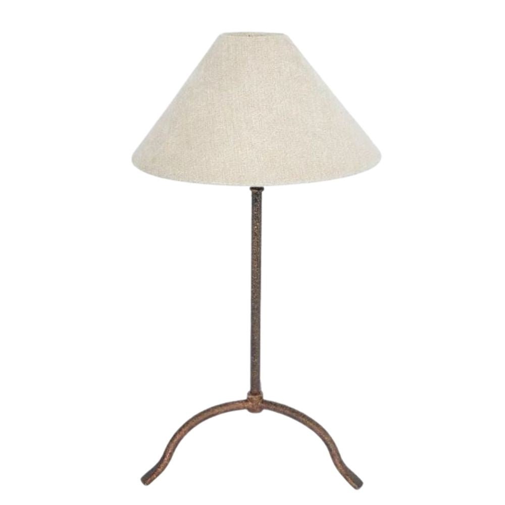 Provence iron table lamp with bronze hand-beaten base and natural linen shade styled on bedside table