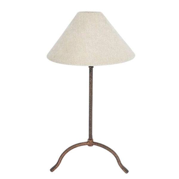 Provence iron table lamp with bronze hand-beaten base and natural linen shade styled on bedside table