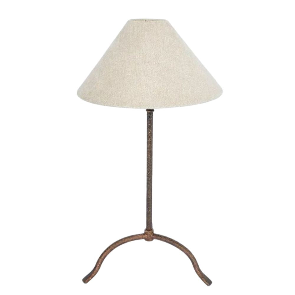 Bronze iron table lamp with linen shade in French country style, featuring a hand-beaten base and conical shade.