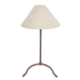 Bronze iron table lamp with linen shade in French country style, featuring a hand-beaten base and conical shade.