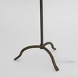 Bronze iron table lamp with linen shade in French country style, featuring a hand-beaten base and conical shade.
