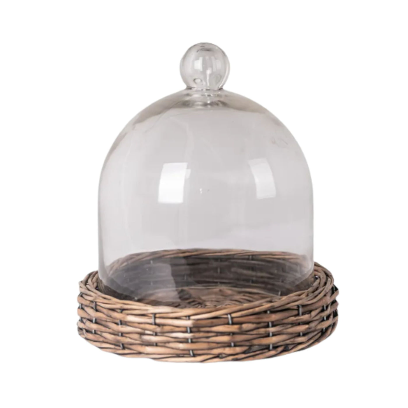 glass cloche with woven willow base on neutral background