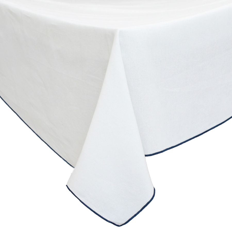 Riviera Tablecloth White Navy cotton tablecloth with elegant navy border detail and soft drape