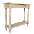 Rustic console table in a living room displaying decorative accents and creating a sophisticated focal point.