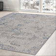 Seacliff Mist Rug styled in a contemporary living room with soft grey, ivory and blue tones.