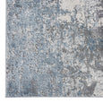 Corner detail of the Shoreline Haze Rug highlighting its sculpted pile, textured abstract pattern and premium finish.