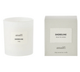 Shoreline soy candle with matching packaging in neutral white tones