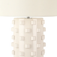 Modern Smith table lamp with ceramic base and off-white linen drum shade styled in a contemporary interior.
