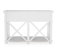 Elegant white console table with drawers and shelf adding storage and style to a contemporary living room