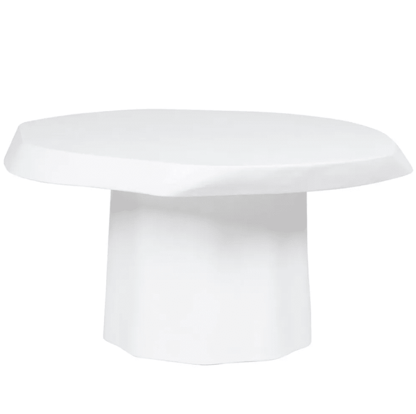 Sorrento Coffee Table in white matte hammered concrete featuring an organic sculptural silhouette in a contemporary living room.