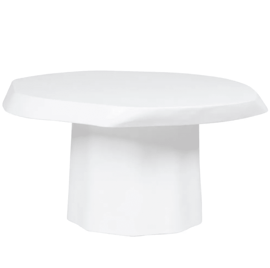 Sorrento Coffee Table in white matte hammered concrete featuring an organic sculptural silhouette in a contemporary living room.