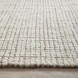 Close-up of Sorrento Rug showing thick hand loomed wool and natural jute weave