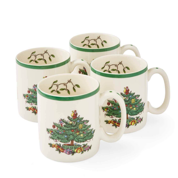 Spode Christmas Tree stoneware mug set of four featuring the iconic festive Christmas tree design and green rim detail.