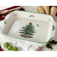 Spode Christmas Tree rectangular serving dish styled with festive vegetables and Christmas table accessories, perfect for holiday entertaining and oven-to-table serving.