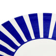 Close-up of the Spode Steccato bold stripe pattern in rich cobalt blue on fine earthenware