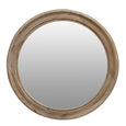 Elegant statement wall mirror styled above a console table in a Hamptons-inspired entryway