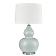 Sutton light blue ceramic table lamp with white shade styled in a Hamptons bedroom