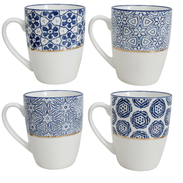 Tucson ceramic mugs set of four featuring assorted blue and white geometric patterns with elegant gold trim.