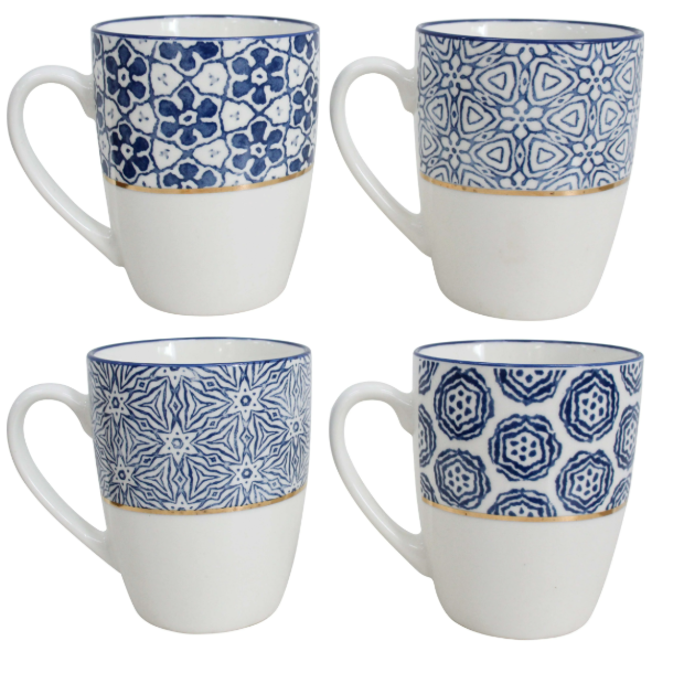 Tucson ceramic mugs set of four featuring assorted blue and white geometric patterns with elegant gold trim.