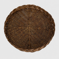 Top view of Twill Rattan Tray Brown showing round handwoven rattan design and braided rim
