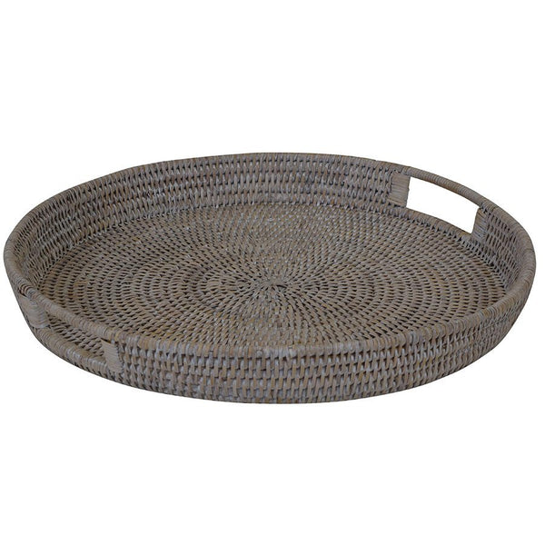 Verandah Round Rattan Tray Small 40cm featuring a muted natural woven finish, raised sides and integrated handles.