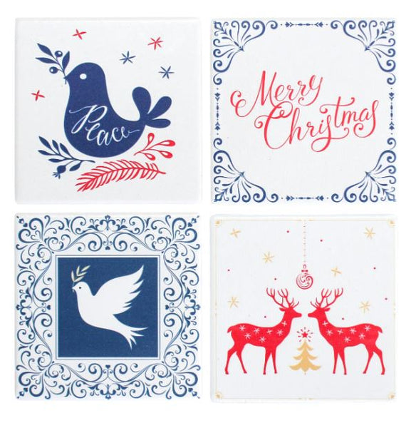 Set of four vintage-style ceramic Christmas coasters featuring festive designs of reindeer, doves, and holiday motifs in red, navy, and white.
