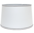 White Shade with Black Trim featuring a tapered drum silhouette and crisp white fabric finish with elegant black edging.