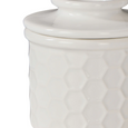 Close-up detail of embossed honeycomb texture on Wildflower & Hive butter bell