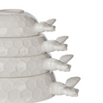 Close-up detail of bee-shaped handles on Wildflower & Hive white measuring cups