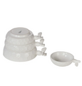 White nesting measuring cups with sculpted bee handles and embossed honeycomb texture
