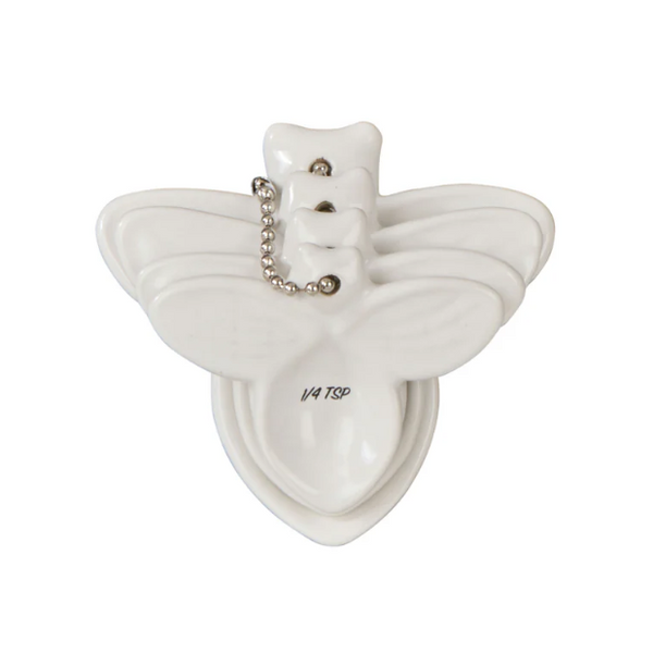 Wildflower & Hive white bee-shaped measuring spoon set in dolomite with silver storage chain
