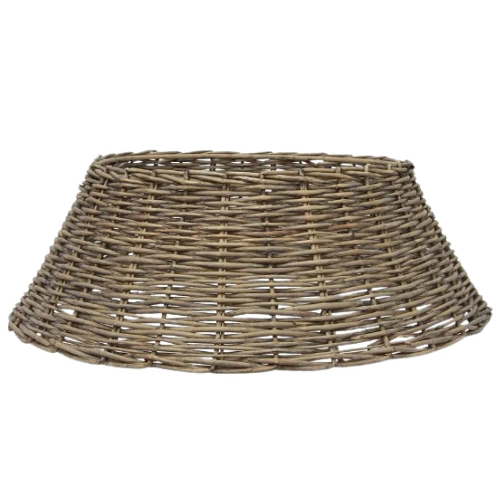 large washed grey wicker tree skirt placed under Christmas tree for rustic festive styling