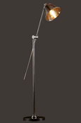 Close-up of Winslow floor lamp adjustable metal shade and brass detailing

