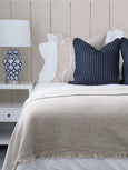Side view of Winton blue and white ceramic table lamp with classic jar silhouette
