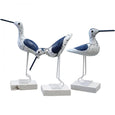 Set of three navy and white decorative coastal birds on white bases, perfect for Hamptons-style home décor.