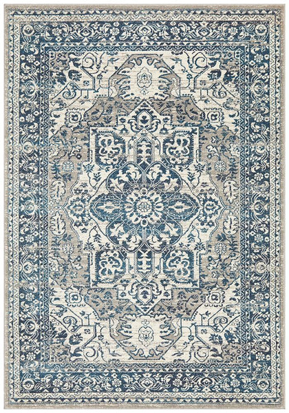 Rectangular Bridgeport Blue rug with classic distressed blue and ivory pattern, shown on a white background
