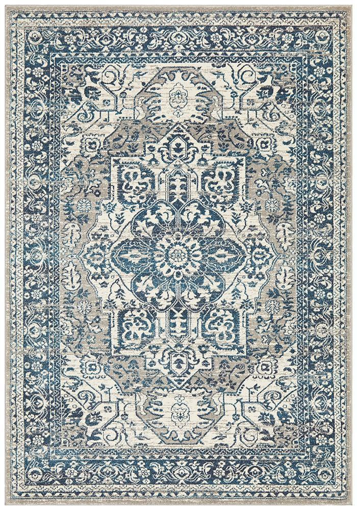 Rectangular Bridgeport Blue rug with classic distressed blue and ivory pattern, shown on a white background