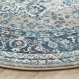 Round blue and ivory rug with classic distressed pattern, Bridgeport Blue Rug Round shown on a light timber floor