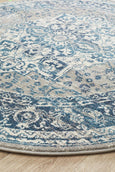 Round blue and ivory rug with classic distressed pattern, Bridgeport Blue Rug Round shown on a light timber floor