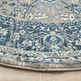 Round blue and ivory rug with classic distressed pattern, Bridgeport Blue Rug Round shown on a light timber floor
