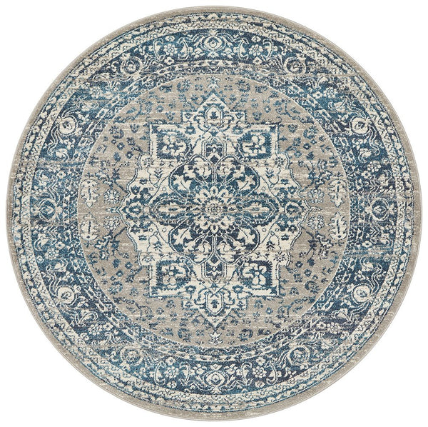 Round blue and ivory rug with classic distressed pattern, Bridgeport Blue Rug Round shown on a white background