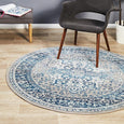 Round blue and ivory rug with classic distressed pattern, Bridgeport Blue Rug Round shown on a light timber floor