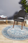Round blue and ivory rug with classic distressed pattern, Bridgeport Blue Rug Round shown on a light timber floor