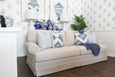 East Hampton Sofa in flax fabric with contrast white piping and skirted base
East Hampton Sofa styled in a Hamptons living room with blue and white décor