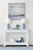 White Hamptons-style Nantucket hall table with two drawers and cross-side detailing