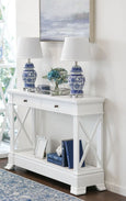 White Hamptons-style Nantucket hall table with two drawers and cross-side detailing